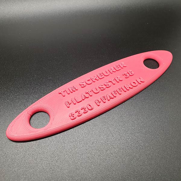 Legally required label for stand-up paddle with name and address, made of weatherproof ASA plastic, writing cannot be smudged, casual SUP shape, can be attached to existing eyelets / elastic band / leash, measures 16x4 cm, weighs only 12gr, available in fashionable colours.